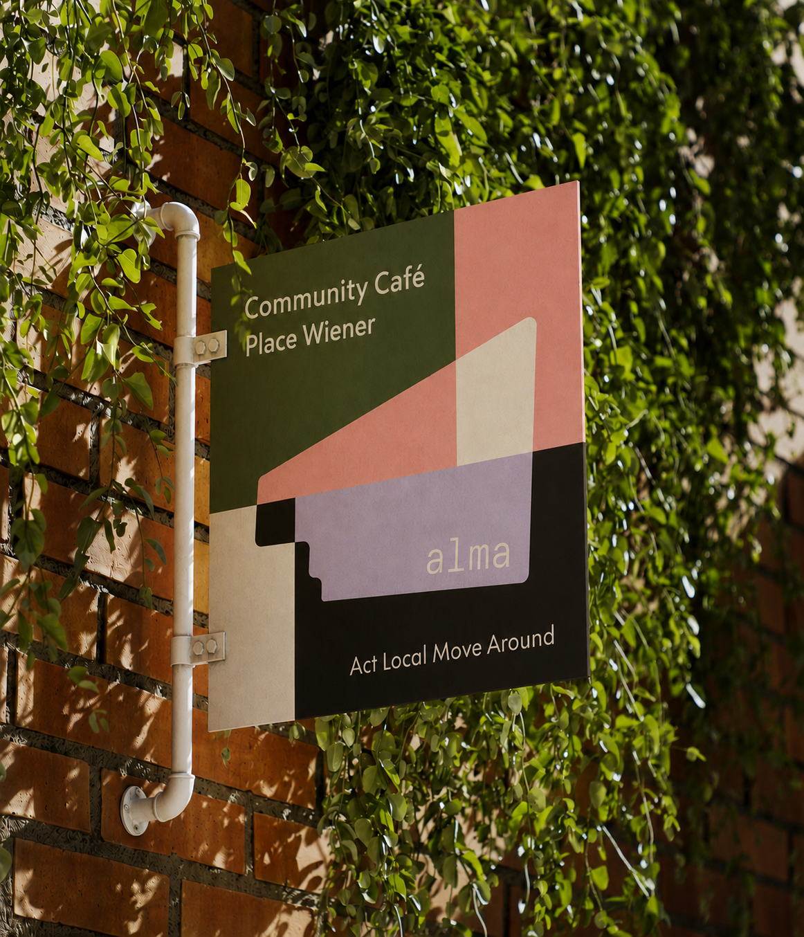 ALMA sign on a brick wall